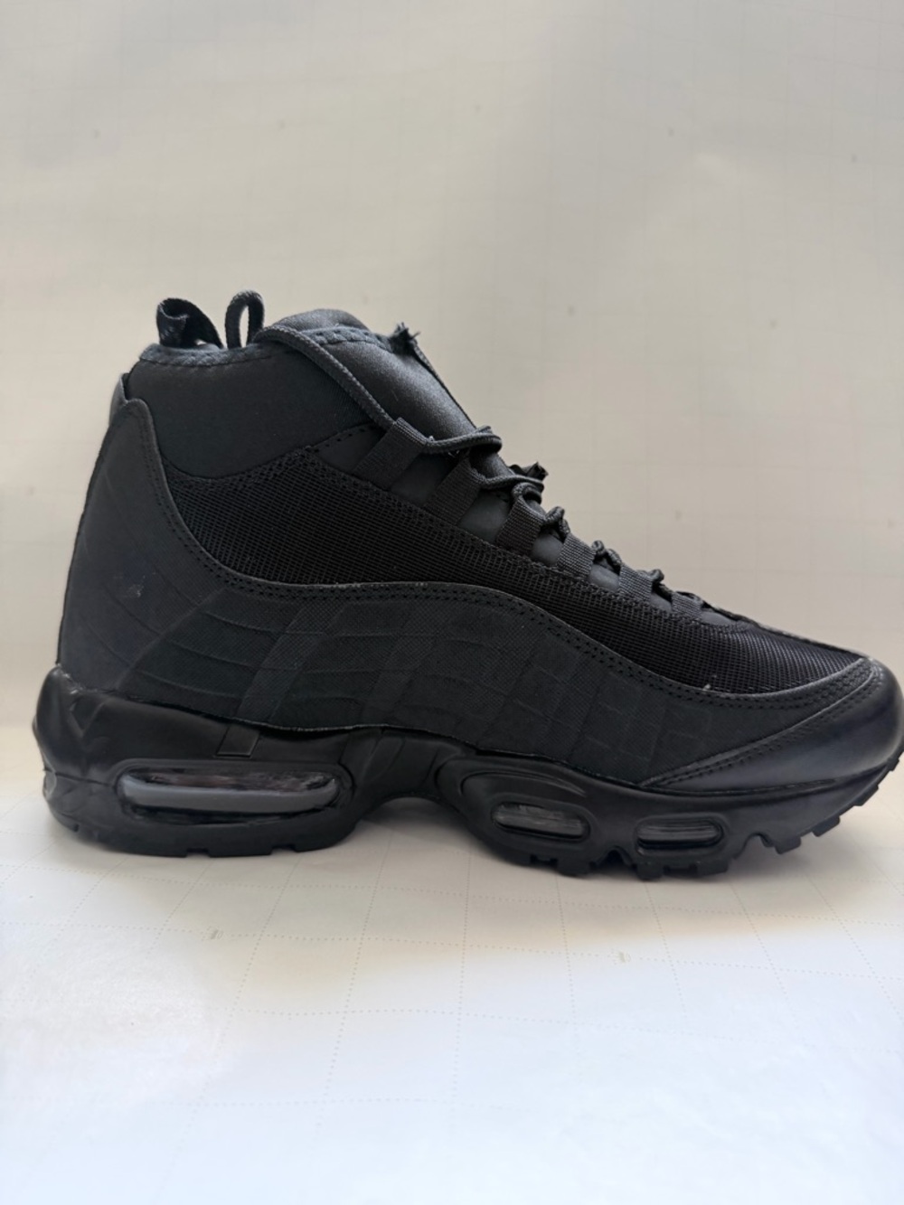 Nike All-Black High-Top Air-Cushioned Sneaker